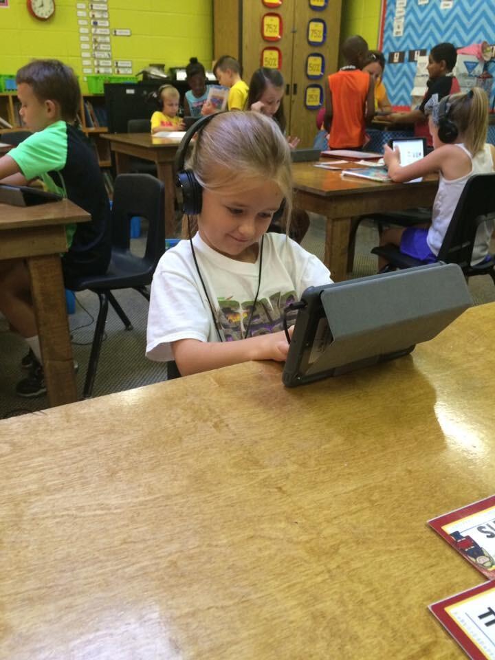 Student using an iPad to learn